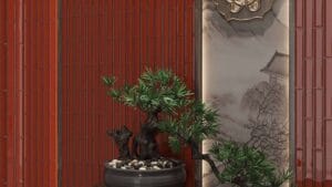 Dense green bonsai tree in a dark gray ceramic pot with decorative stones, placed against a red brick wall and traditional Asian-style painting, evoking a serene, zen-inspired outdoor or indoor garden setting.