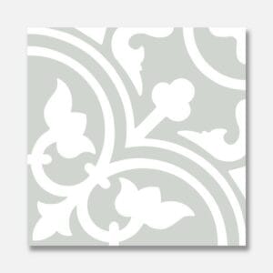 Intricate decorative white ceramic tile with floral and leaf patterns for home renovation or bathroom renovation. Perfect for stylish wall or floor decor.