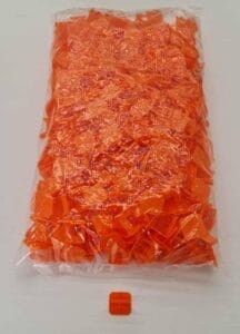 Bright orange LEGO bricks in a large plastic bag, perfect for building and creative projects, available at Builders Warehouse Online—your trusted source for quality construction and hobby supplies.
