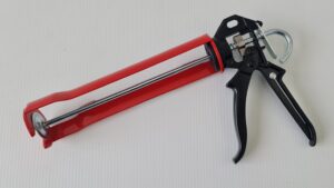 CAULKING GUN RED