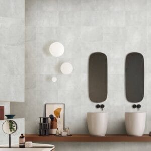 Tile Samples 28 Sleek modern bathroom with minimalist design, featuring black oval mirrors, white vessel sinks, and contemporary decor, perfect for stylish home renovation projects.