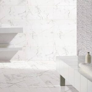 White marble tile bathroom interior with minimalist design, modern fixtures, and elegant decor, showcasing high-quality building materials for home renovations and interior upgrades at Builders Warehouse Online.