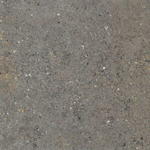 Grey concrete surface with aggregate texture for construction, flooring, or outdoor projects. Suitable for builders and DIY enthusiasts seeking durable and stylish materials.