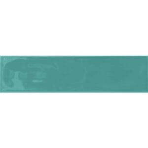 Glossy teal ceramic tile for backsplash and wall decoration, ideal for home improvement projects. Durable, stylish, and easy to clean ceramic tile, perfect for kitchens and bathrooms.