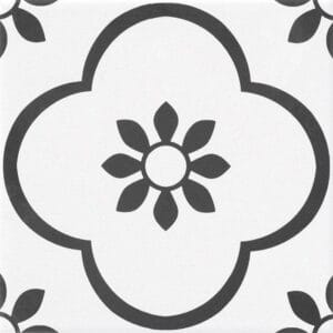 Vintage black and white decorative tile with floral pattern, suitable for home improvement and renovation projects. Perfect for kitchens, bathrooms, and outdoor spaces.
