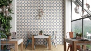 Vintage industrial dining room with eclectic metal chairs, modern pendant lighting, and geometric wallpaper, showcasing stylish interior design elements at Builders Warehouse Online.