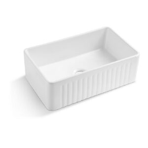 White rectangular ceramic sink with fluted front apron and central drain hole by www.builderswarehouseonline.com.au