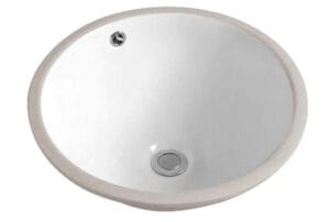 Shallow white ceramic bathroom sink with overflow hole and silver drain, ideal for modern residential and commercial bathroom renovations. Perfect for plumbing and fixture installations.