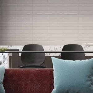 Modern Office Conference Room with Black Chairs and Light Gray Tile Wall, Indoor Workspace Furniture from Builders Warehouse Online.