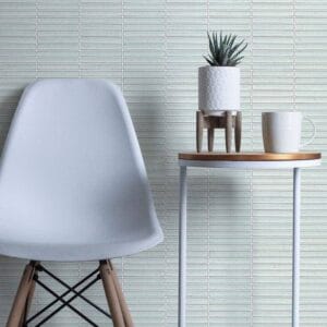 Tile Samples 26 Modern interior decor with a sleek white chair, minimalist side table, and potted plant, showcasing stylish home furnishings from Builders Warehouse Online.