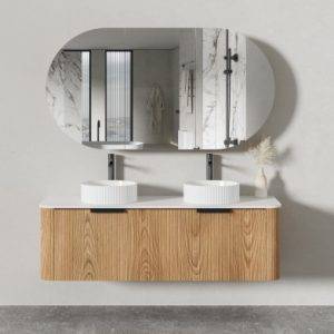 Modern bathroom vanity with dual vessel sinks and wall-mounted wooden cabinet, featuring marble accents and a large oval mirror, ideal for contemporary home renovation and bathroom upgrade projects.