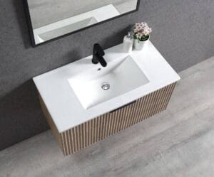 Modern bathroom vanity with white ceramic sink, black faucet, and wooden slatted cabinet. Perfect for bathroom remodeling, featuring stylish design and durable materials for home renovation projects.