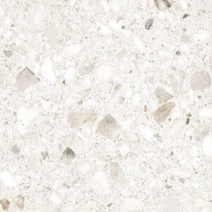 White terrazzo surface with a mix of stone chips and aggregate, ideal for flooring and decor in construction projects. Perfect for contemporary, stylish interiors and outdoor applications.