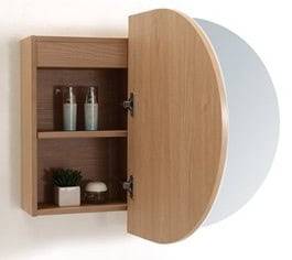 Modern bathroom vanity with round vessel sink, wall-mounted mirror, and minimalist decor, emphasizing stylish bathroom renovation and plumbing fixtures.